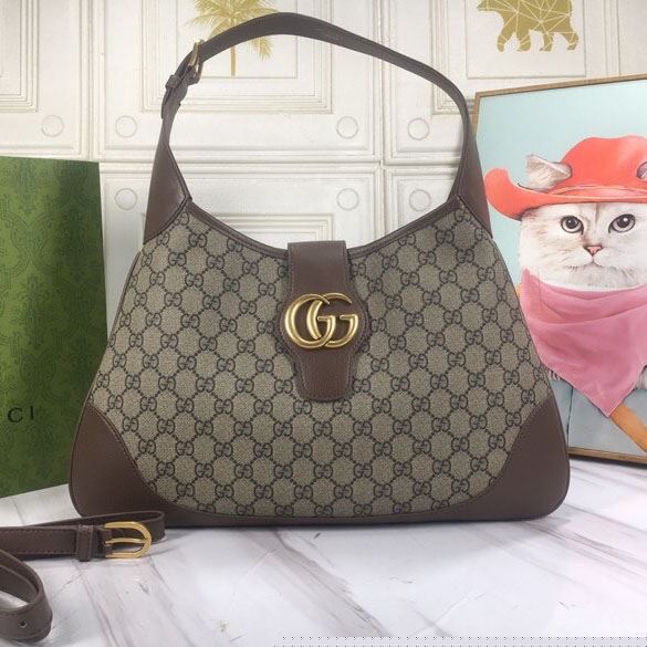 G*u*i top handle bags